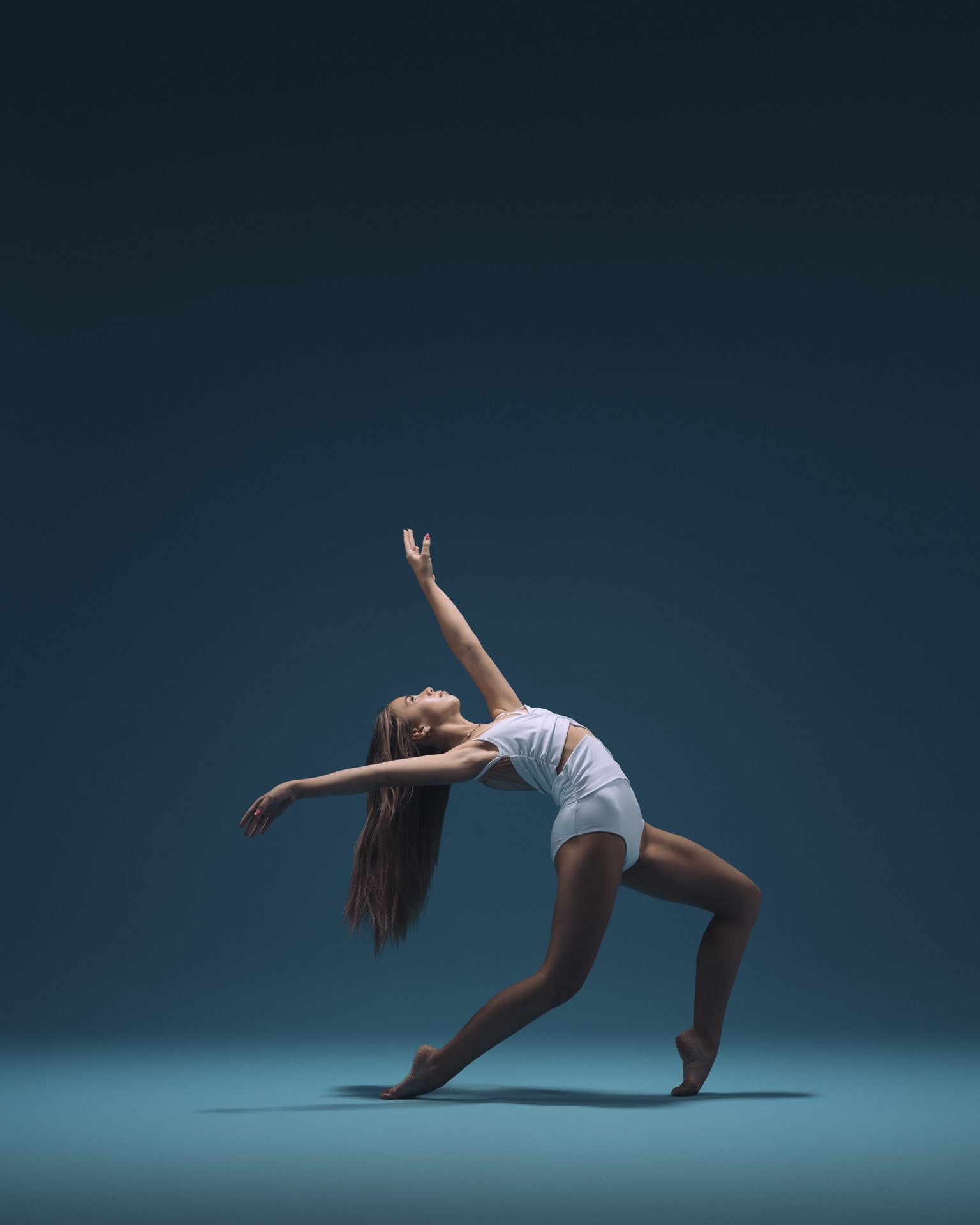 Ambition dancer reaching in a backbend