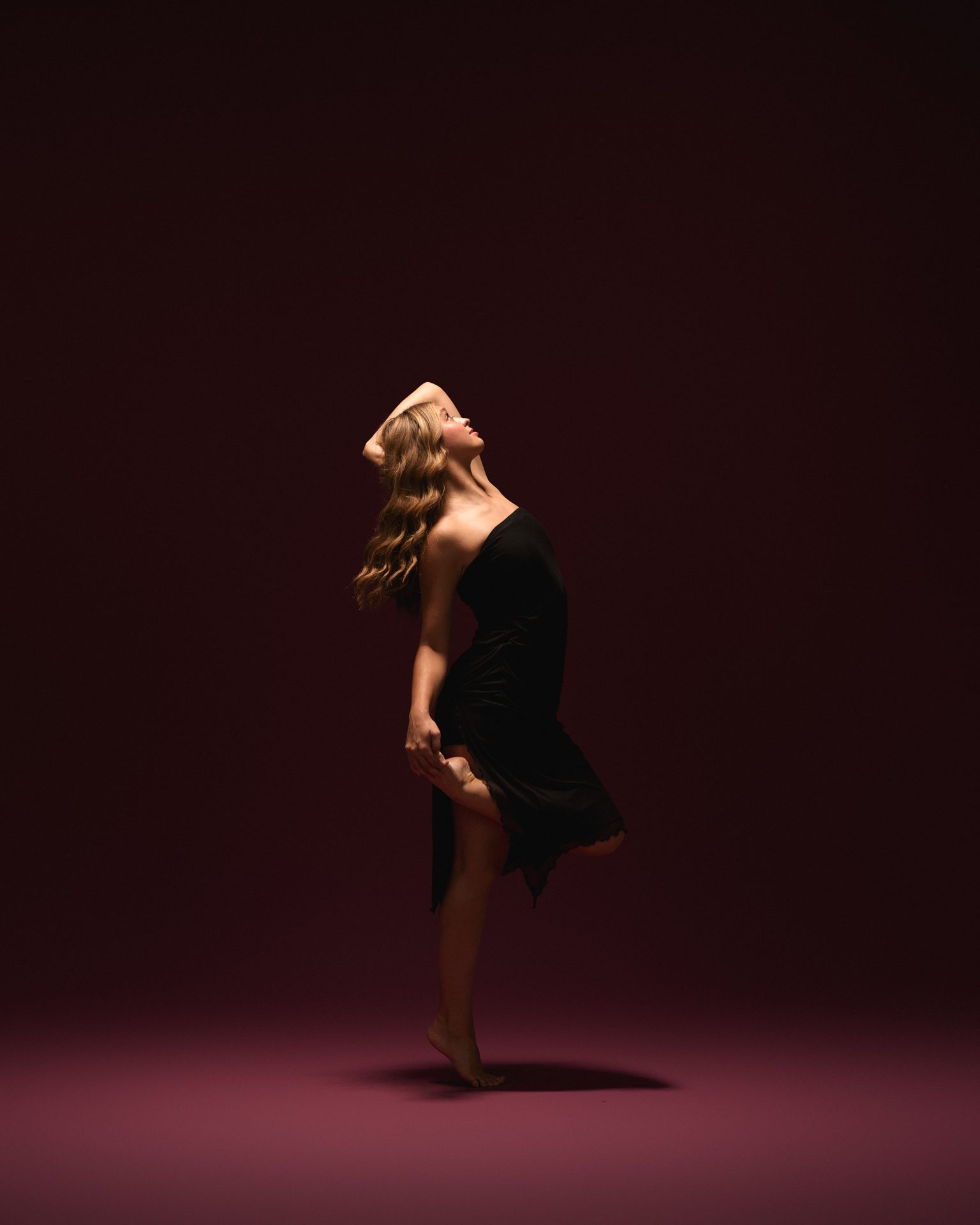 Performer in a dramatic stage pose